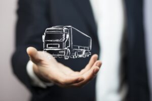Truck Accident Lawyer showing graphical truck on his hand