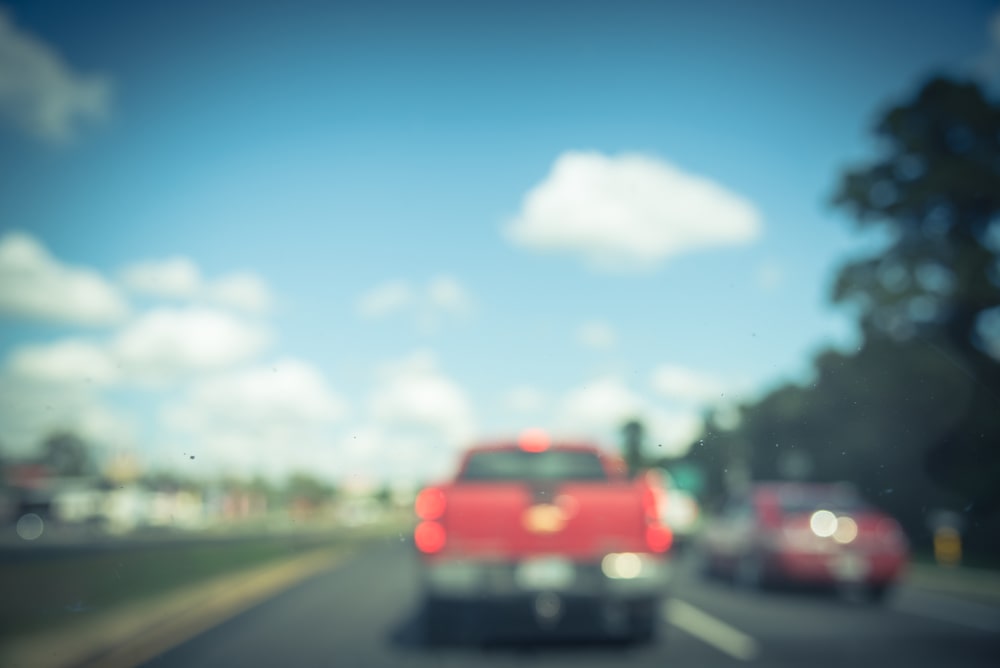 Blurred roadway view representing visual distraction while driving in New Hampshire