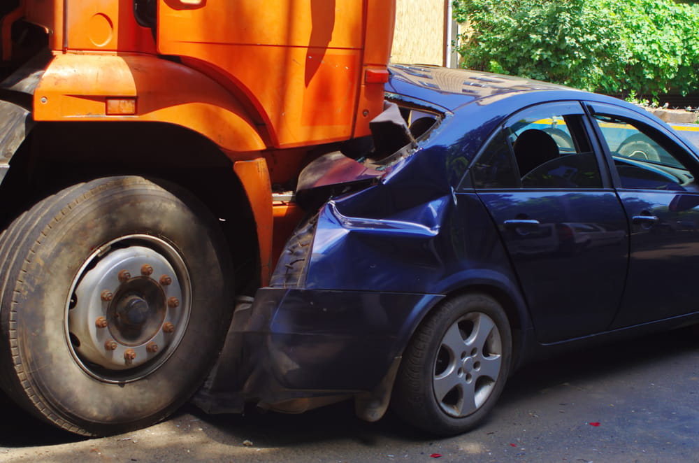 Rear-end collision involving truck and car illustrating accident claim scenario
