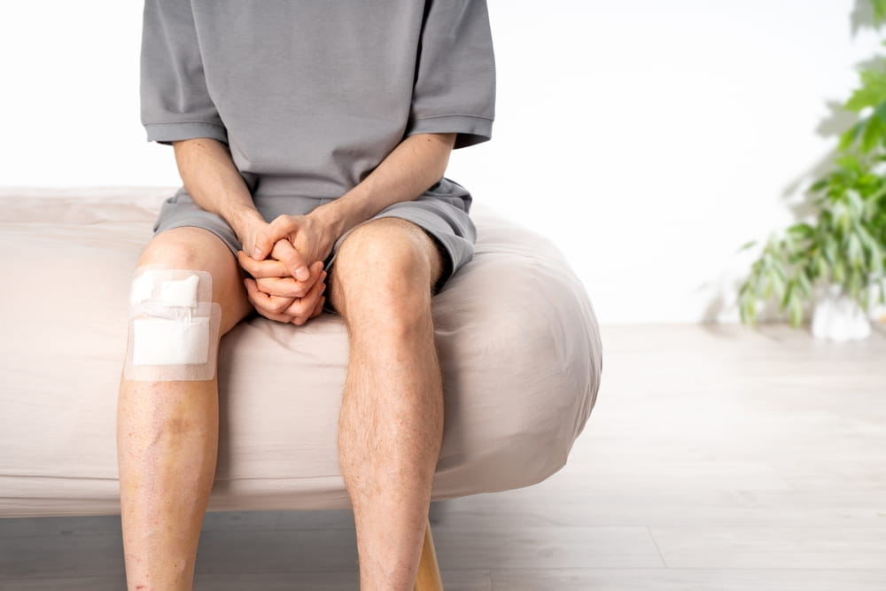 Injury victim recovering from an accident while waiting for medical improvement