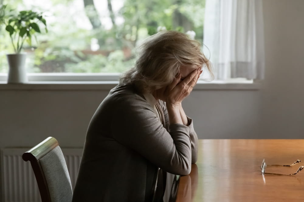 Family member grieving the loss of a loved one after a wrongful death accident